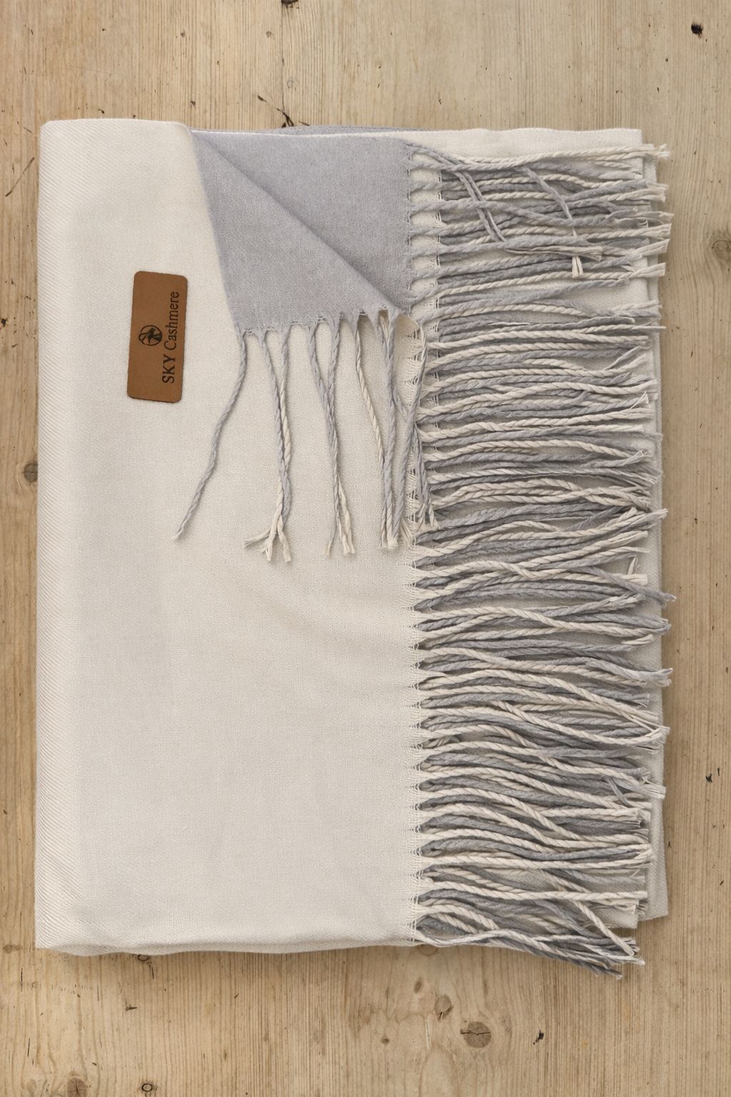 Cream and grey scarf.