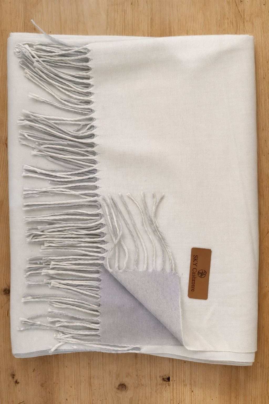 Cream and grey scarf.